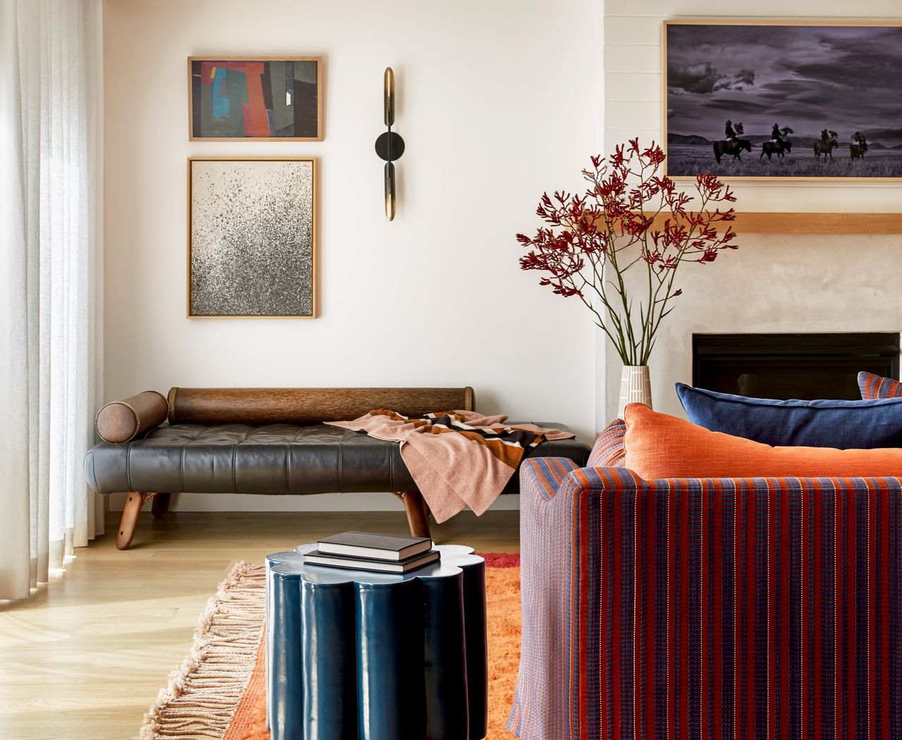 A living room with a variety of patterns