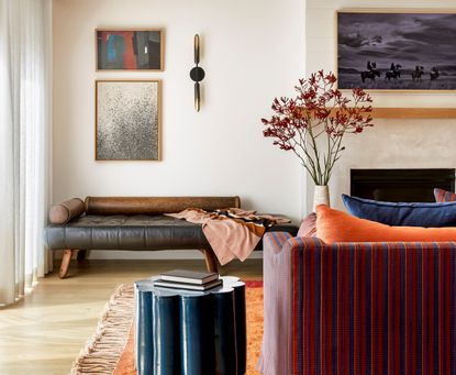 A living room with a variety of patterns