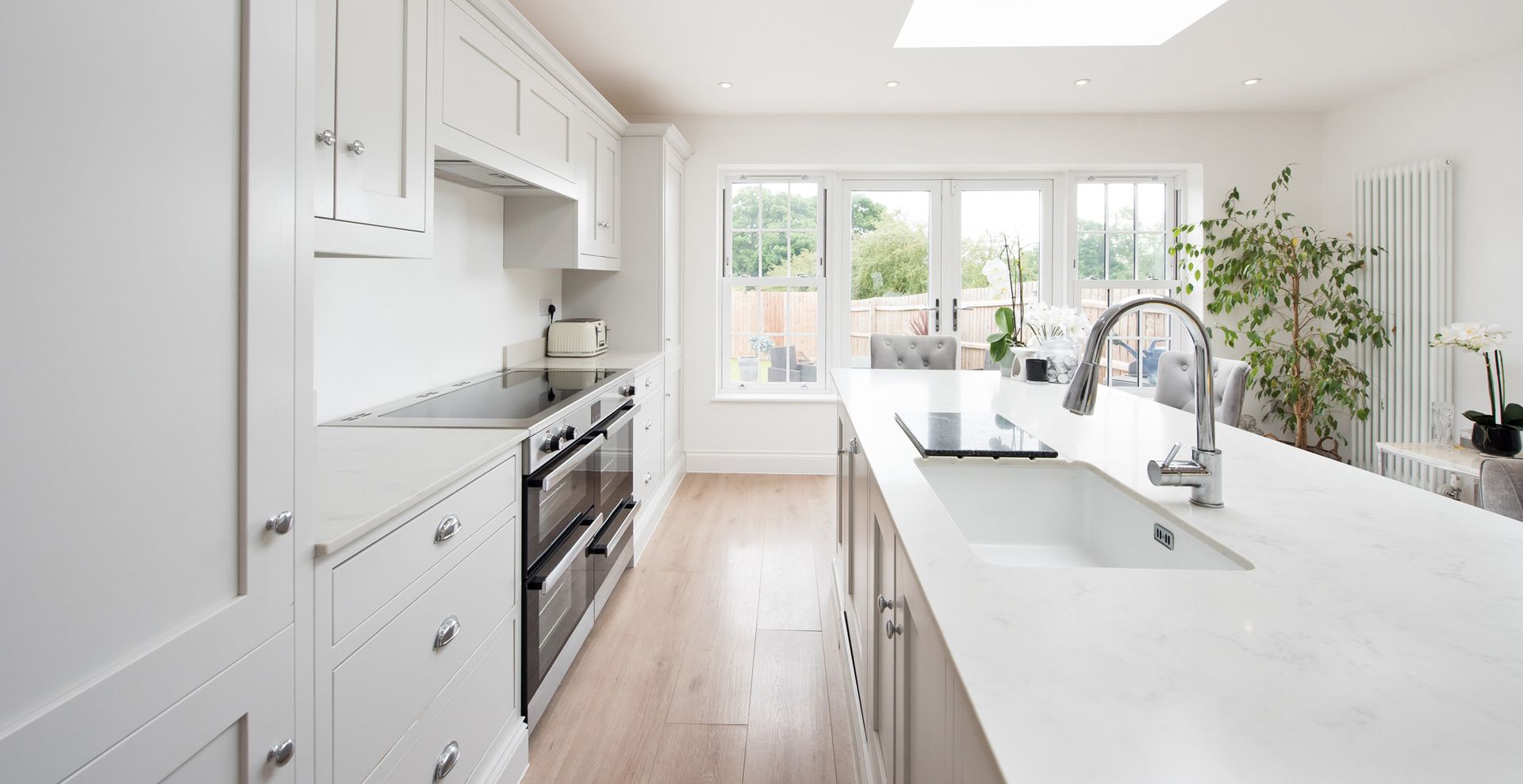 white kitchen showing the results of cleaning a kitchen