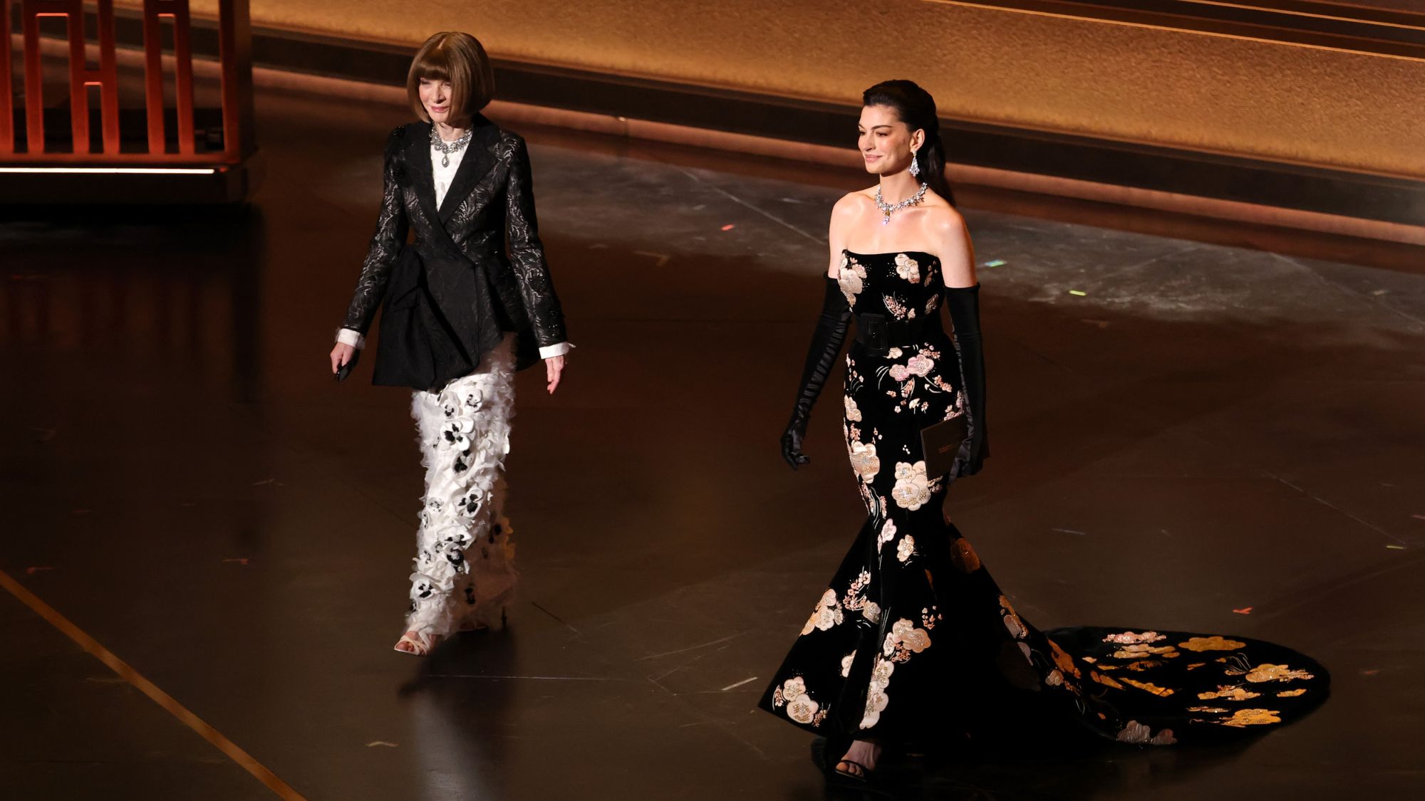 Anna Wintour and Anne Hathaway on stage at the 2026 Oscars