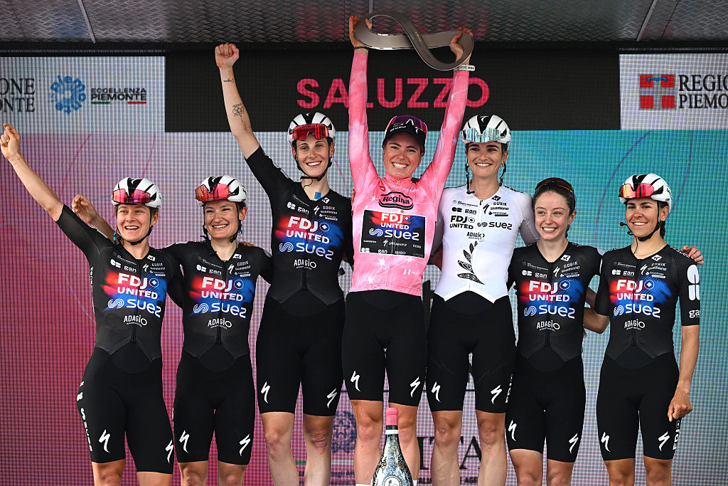 SALUZZO, ITALY - JUNE 07: Final overall race winner Demi Vollering of Netherlands - Pink Leader Jersey (C), Celia Gery of France, Lauren Dickson of Great Britain, Vittoria Guazzini of Italy, Amber Kraak of Netherlands, Eva Van Agt of Netherlands, Ally Wollaston of New Zealand and Team FDJ United - SUEZ celebrate at podium during the 37th Giro d&amp;amp;apos;Italia Women 2026 - Stage 9 a 145km stage from Saluzzo to Saluzzo / #UCIWWT / on June 07, 2026 in Saluzzo, Italy. (Photo by Luc Claessen/Getty Images)