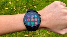 Huawei Watch GT 3 on tester's wrist outdoors