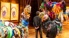A man looking at Nnela Kalu's sculptural artwork at the Turner Prize exhibition