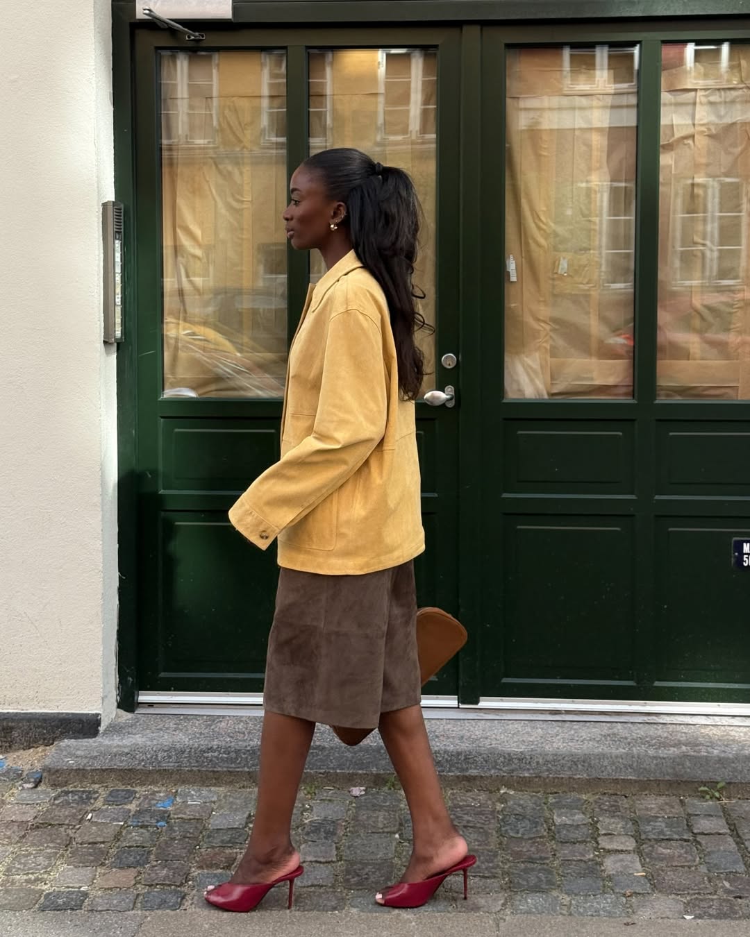 @_livmadeline yellow jacket brown shorts