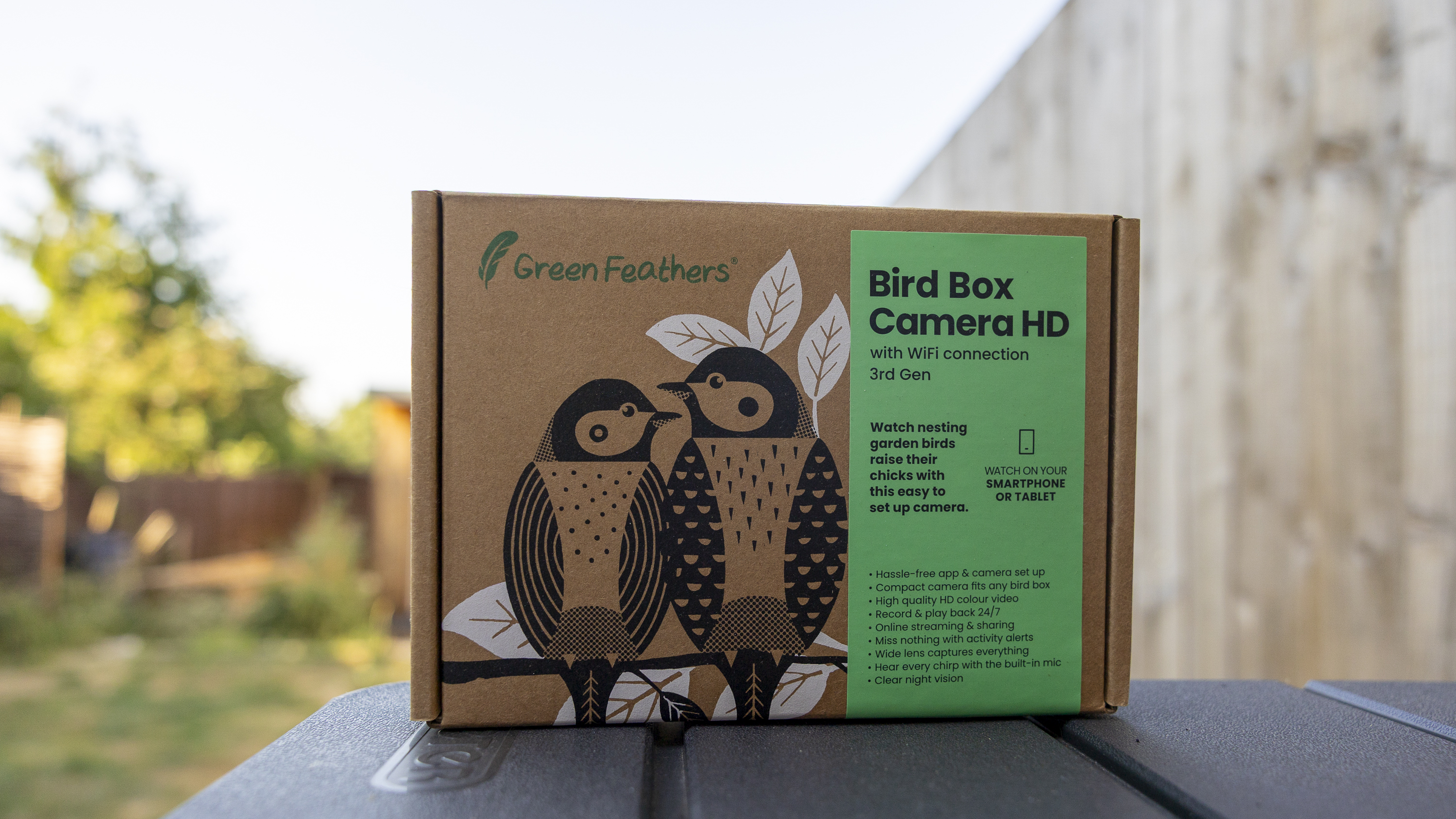 The cardboard box for the Green Feathers HD WiFi bird box camera