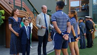 Prince William and Princess Catherine with Prince George speak with Ball Boys & Ball Girls
