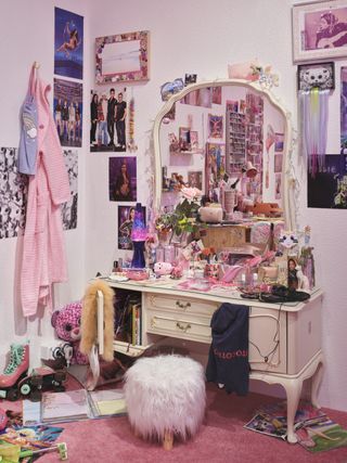 girl's pink bedroom with dressing table clutter