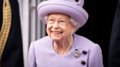 Queen Elizabeth II attends an Armed Forces Act of Loyalty Parade at the Palace of Holyroodhouse on June 28, 2022
