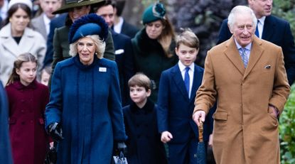 Princess Charlotte, Catherine, Princess of Wales, Camilla, Queen Consort, Prince Louis, Prince George and King Charles III attend the Christmas Day service at Sandringham Church on December 25, 2022.
