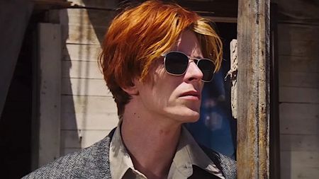 a red-haired man wearing sunglasses