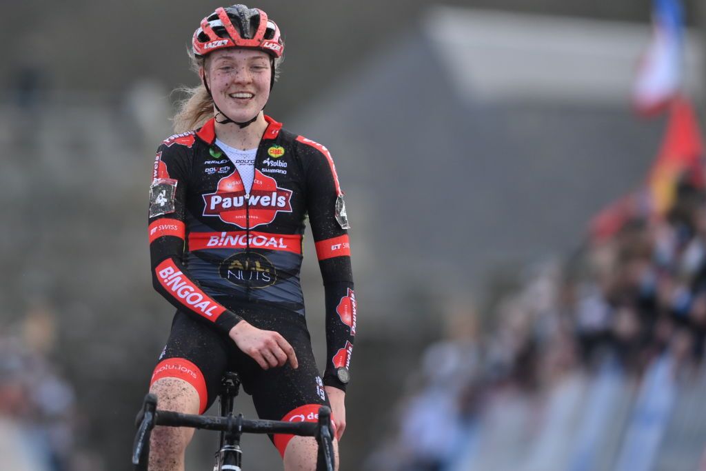 Dutch Fem Van Empel celebrates as she crosses the finish line to win the womens elite race at the Cyclocross World Cup cyclocross event in Flamanville France Sunday 16 January 2022 the 14th stage out of 15 in the World Cup of the 20212022 seasonBELGA PHOTO DAVID STOCKMAN Photo by DAVID STOCKMANBELGA MAGAFP via Getty Images