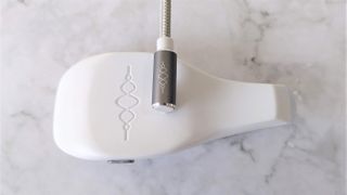 Incus Nova with charging cable attached