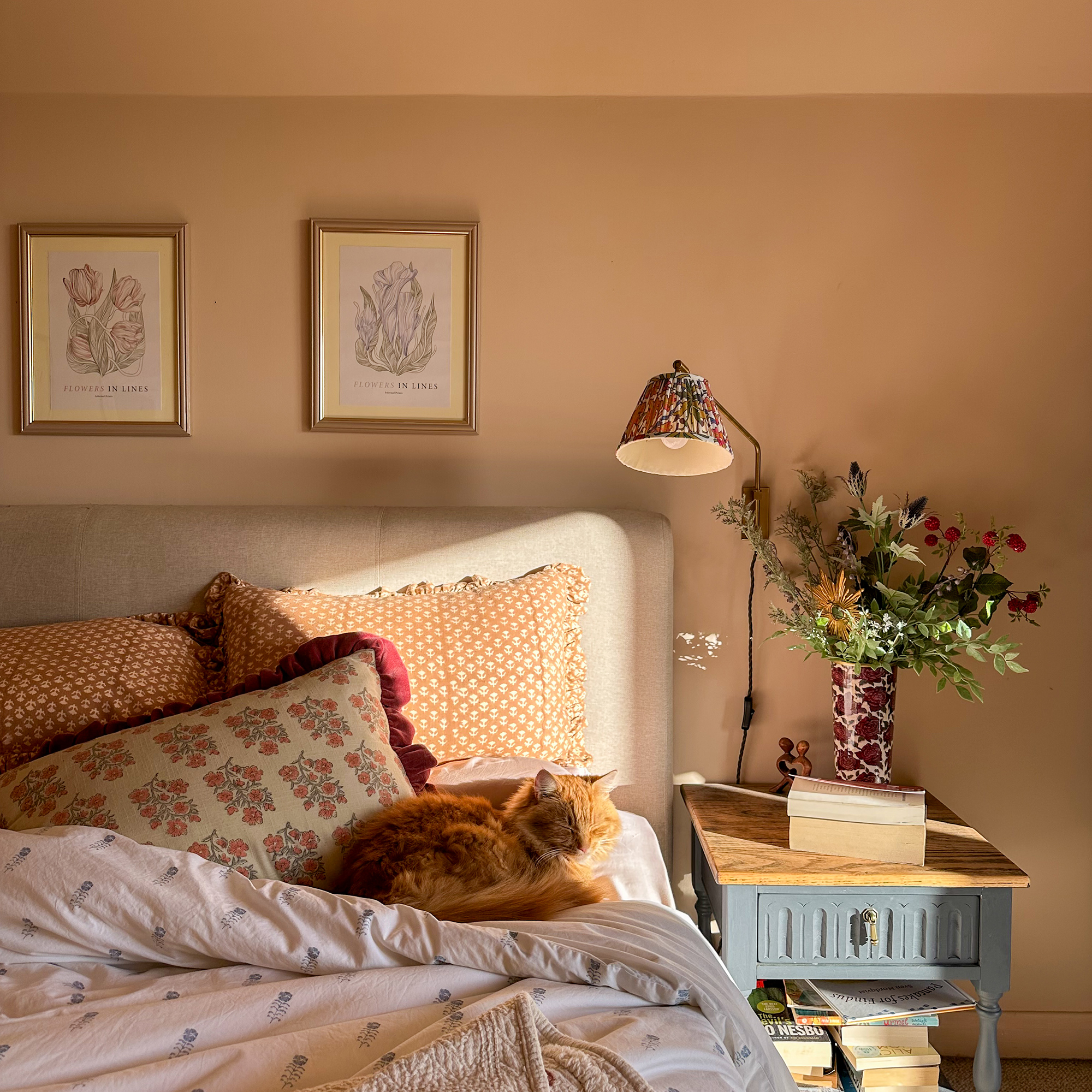 bedroom with wall mounted light
