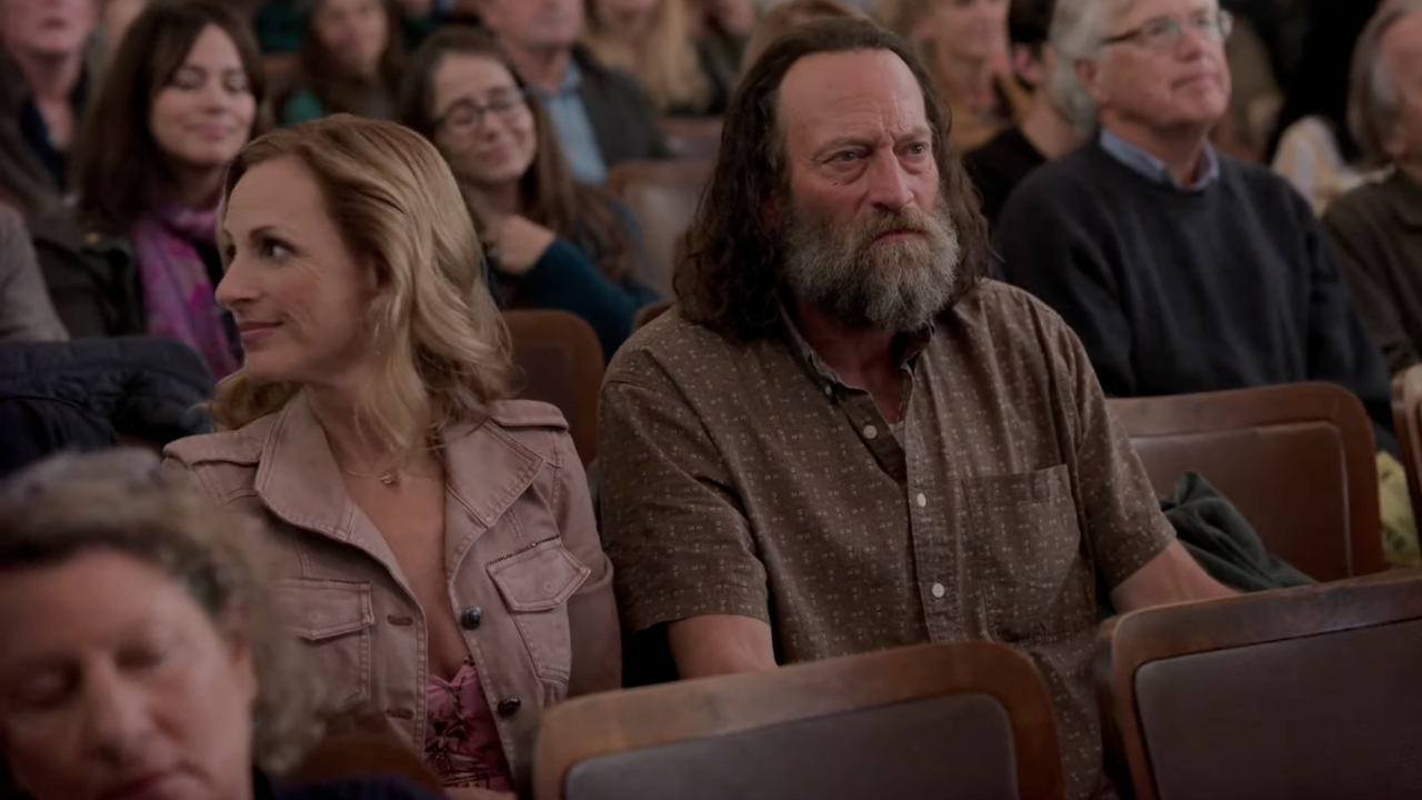Marlee Matlin and Troy Kotsur as Jackie and Frank Rossi looking confused at Ruby's choir performance.