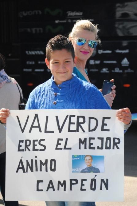 A young Valverde fan with his proud mother standing behind him