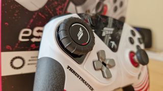 Thrustmaster eSwap XR Pro Controller's racing wheel module embedded in the controller