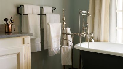 Towels in beautiful bathroom with bathtub