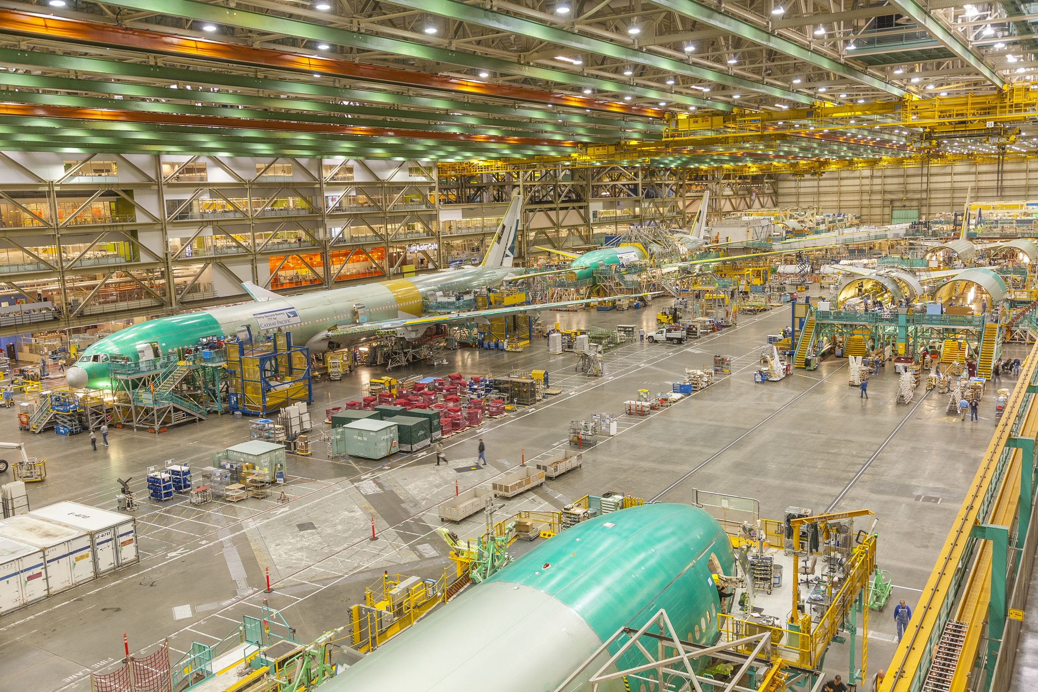 Boeing Factory workers assemble Boeing 777 airliners at the Boeing factory in Everett, WA. This building is said to be the largest building in the world under one roof.