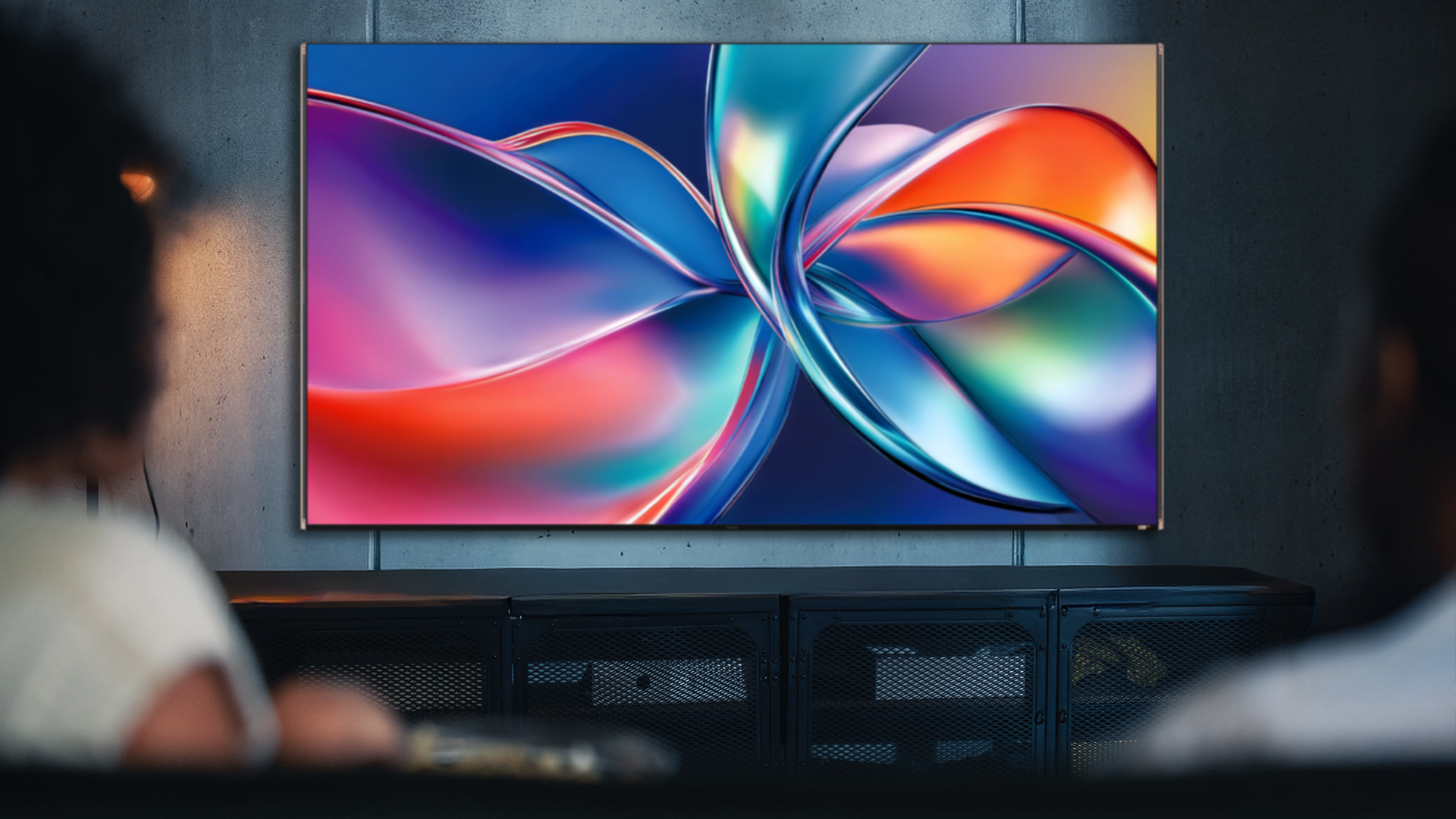 Dolby Vision 2 image running on TV with couple in foreground