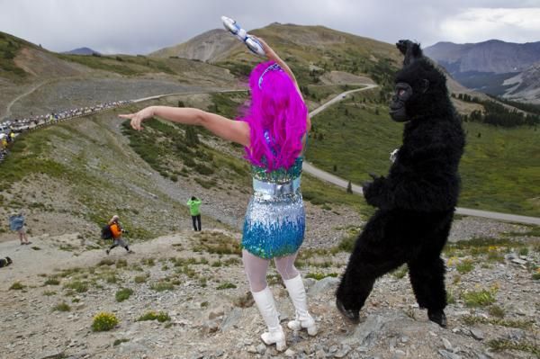 Maybe it's the lack of oxygen? Some colourful locals cheer on the peloton on Cottonwood Pass