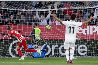 Taty Castellanos scores the third of his four goals for Girona against Real Madrid in a 4-2 win in April 2023.
