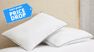Two Westin pillows propped against each other on bed with a Tom's Guide 'price drop' badge