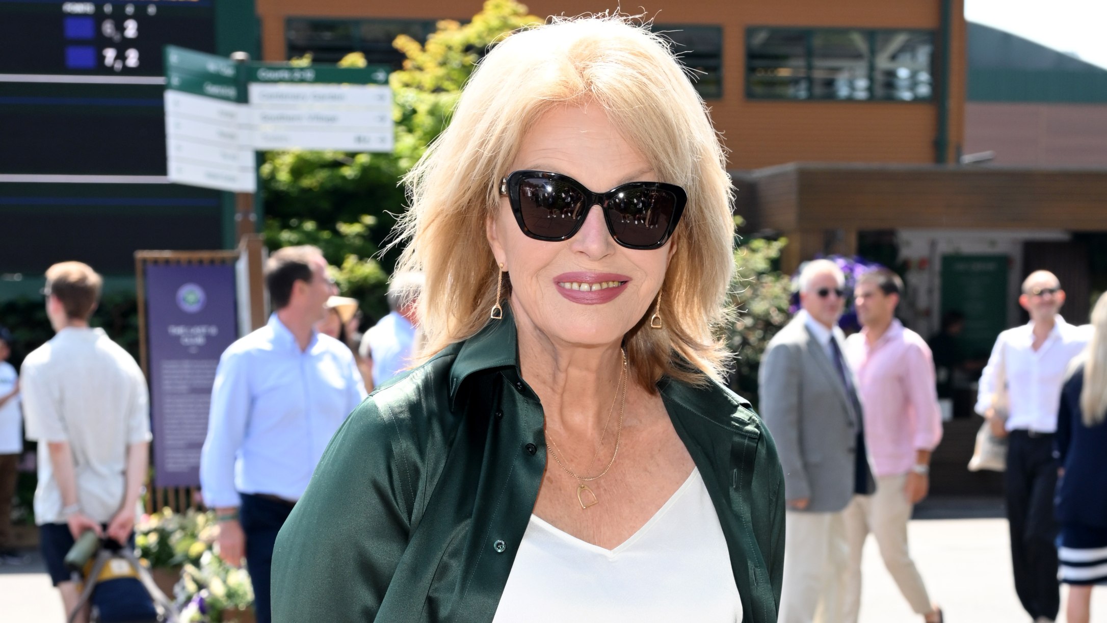 Joanna Lumley, wearing Ralph Lauren, attends day fourteen of the Wimbledon Tennis Championships on July 13, 2025
