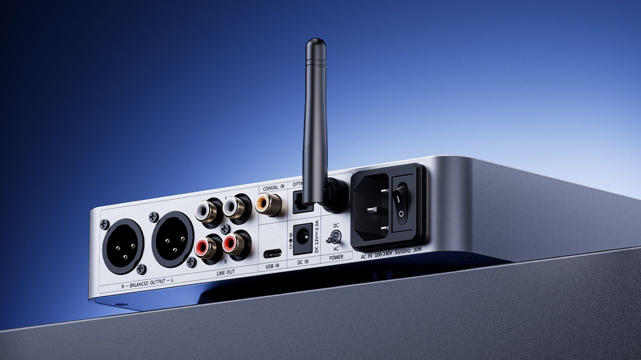 Product shot of the FiiO K13 R2R against a blue gradient background