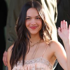 Olivia Rodrigo attended the Chlo&eacute; Fall 2026 fashion show in a leading Spring 2026 dress trend