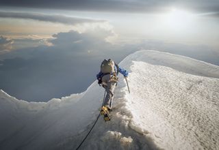 A climber at altitude in the Alps