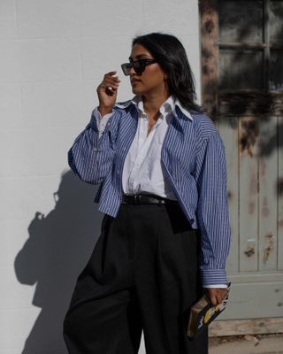 white shirt outfits: @chiarasatelier wears a white shirt with black trousers
