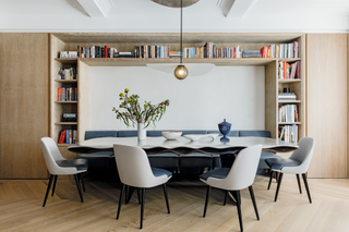 A dining room with built-in storage