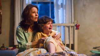 Lili Taylor and Joey King in The Conjuring