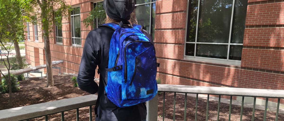 Person wearing Mancro travel backpack