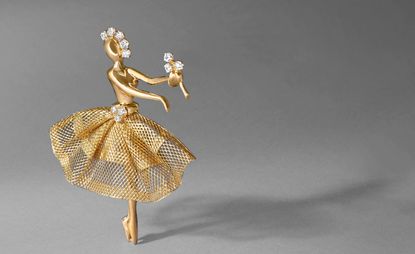 Gold ballerina brooch