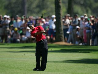 Tiger Woods hitting an iron shot at the 2005 Masters