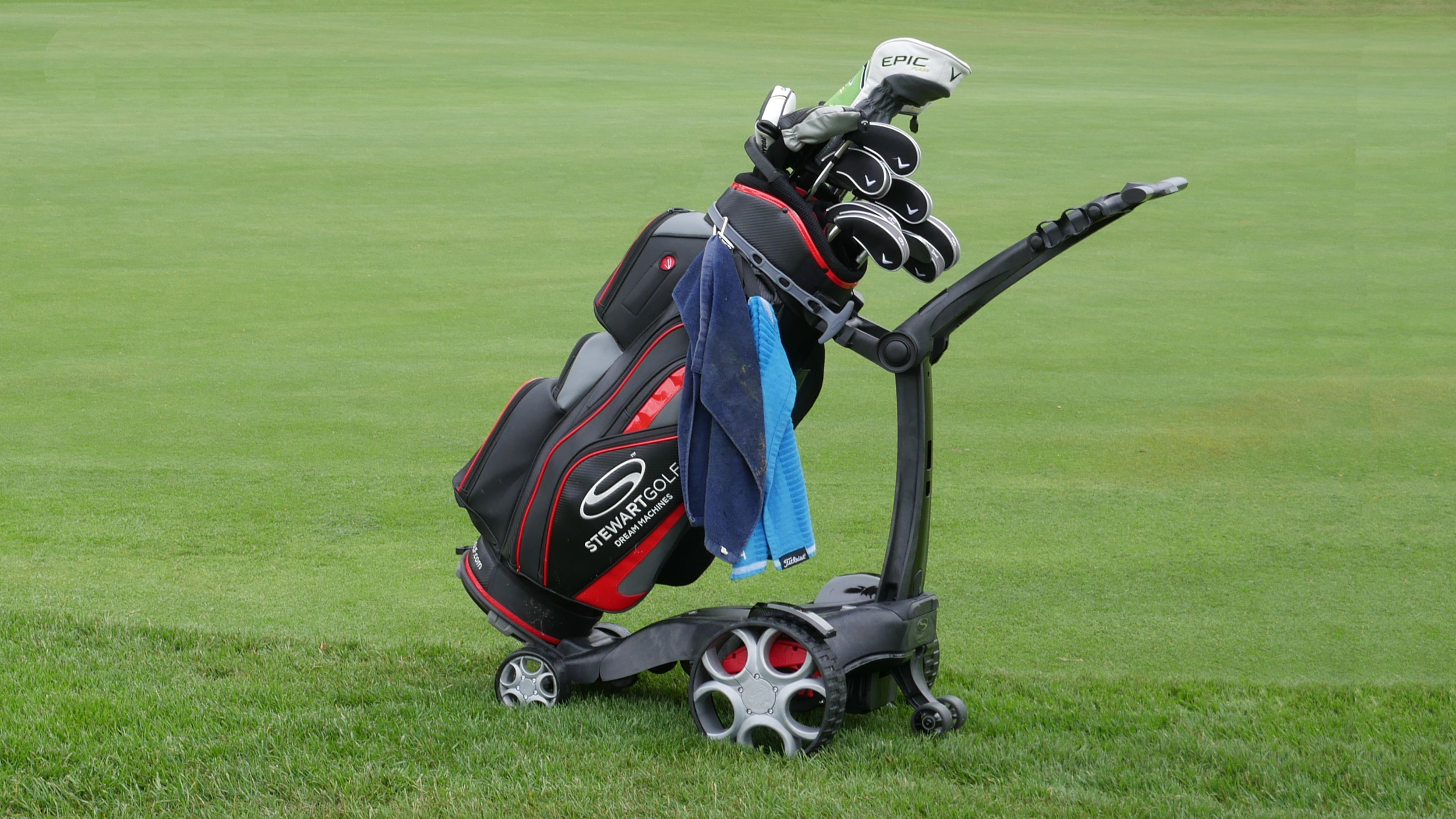 The Q Follow Electric golf trolley on golf course