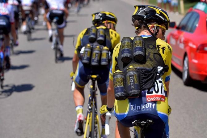 Two Tinkoff-Saxo riders with their bidon vests on