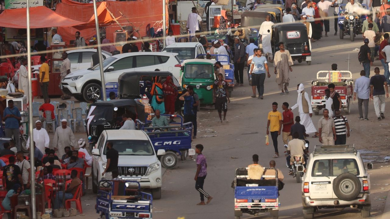 People gather in the Sudanese town of Wadi Halfa bordering Egypt