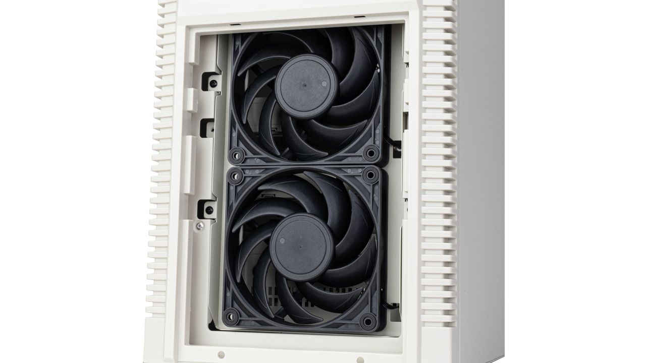 A promotional image of the SilverStone SST-FLP02 PC case, highlight its retro-styled features