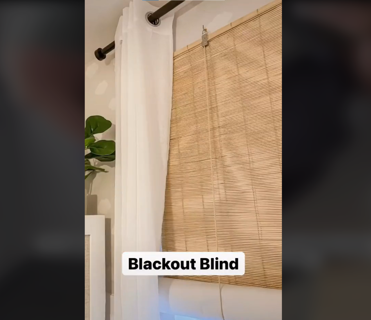 DIY bamboo blackout blinds installed into a bedroom to cover the window