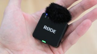 Rode Wireless Go Gen 3 microphone held in a hand