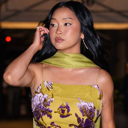 Lana Condor was spotted in NYC wearing the perfect wedding guest dress in moss green and lilac purple