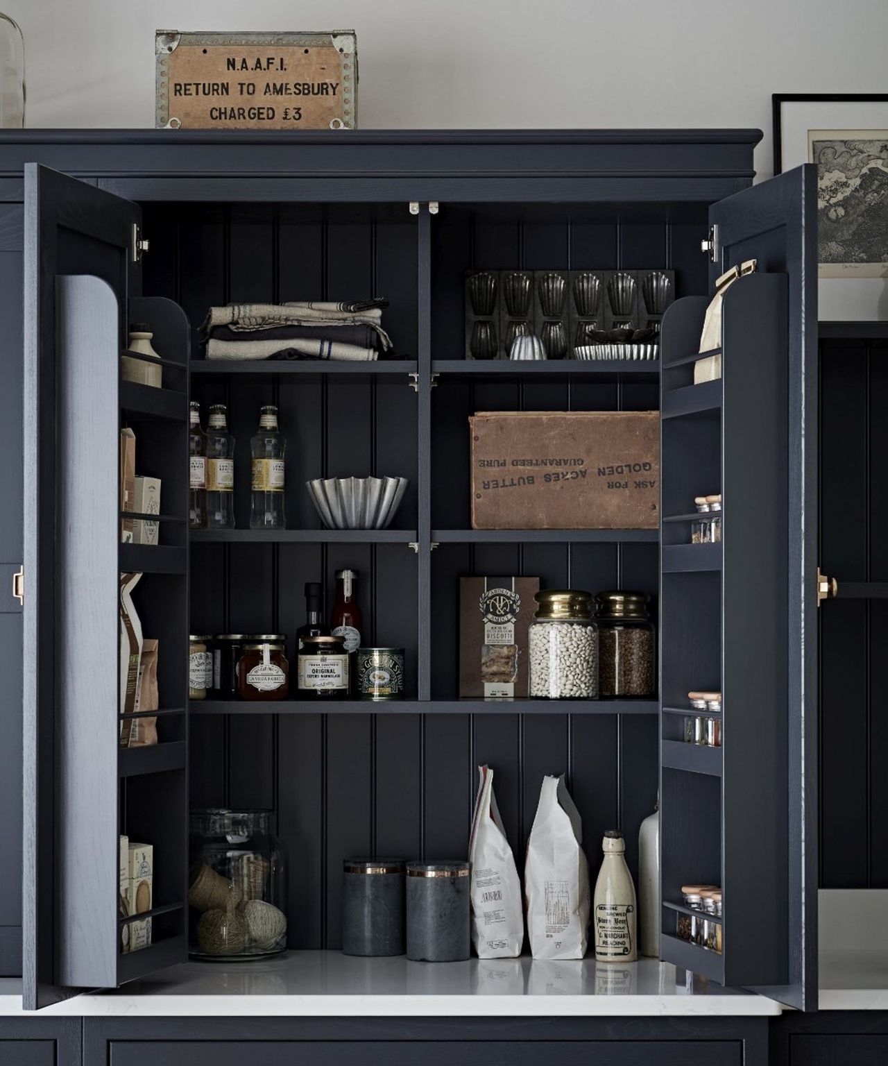 what-to-put-in-high-kitchen-cabinets-according-to-experts-homes