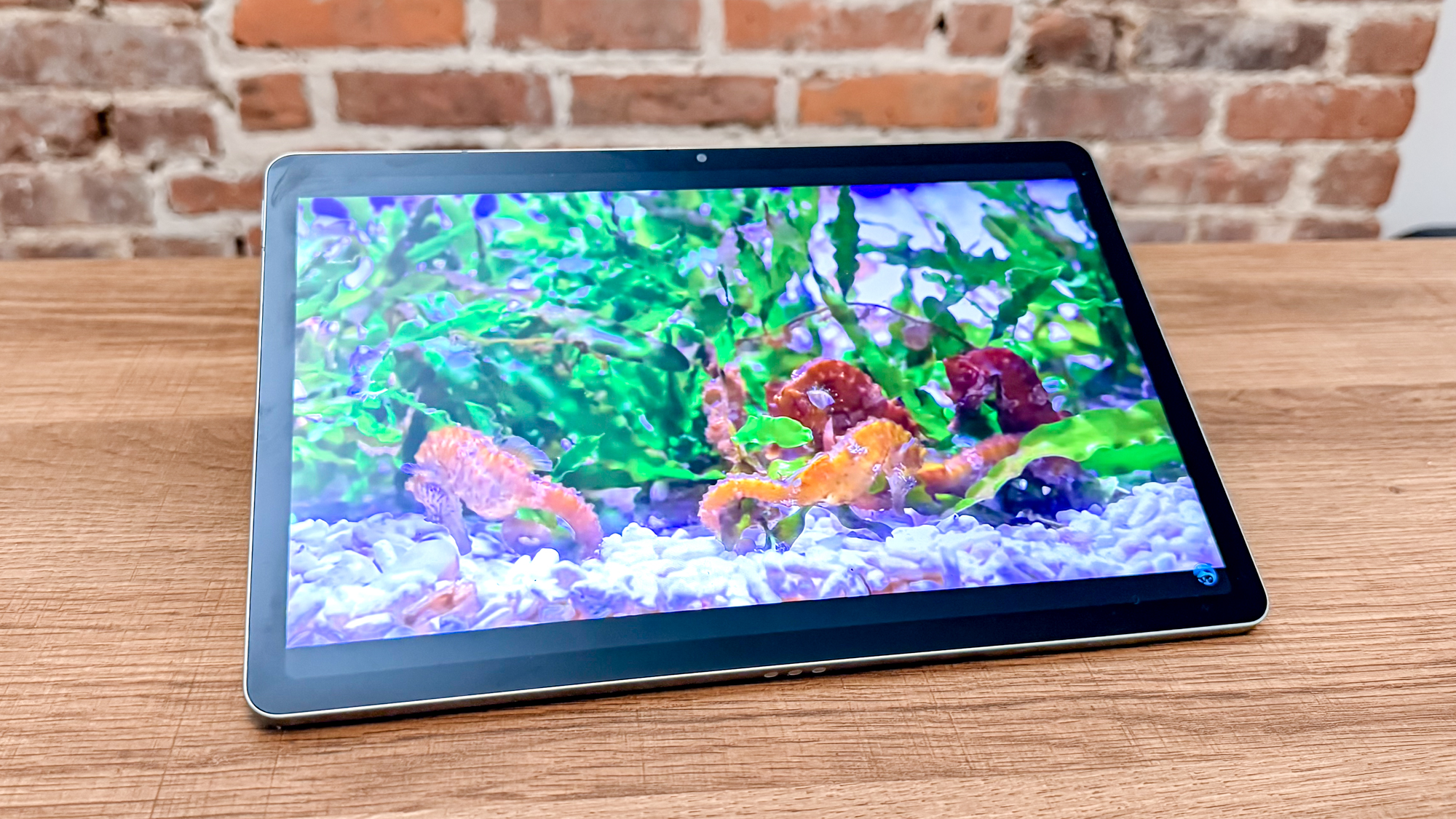 The Motorola MotoPad (2026) on a table showing off its display