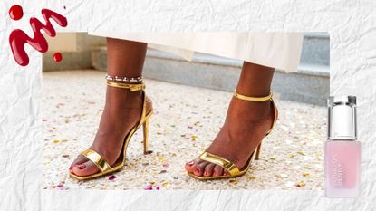 A woman's feet wearing gold sandals with a red pedicure, next to spill of red gel polish and a bottle of leighton denny nail strengthener