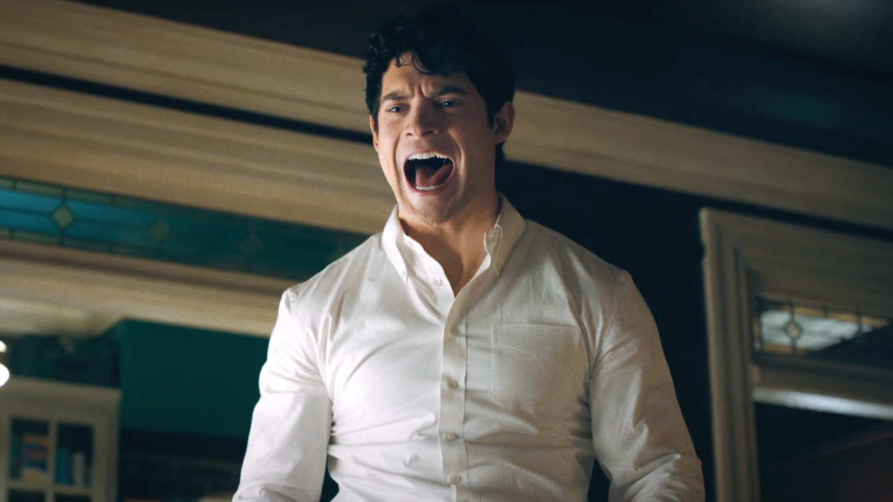 David Corenswet stands shouting in his apartment in Superman (2025).