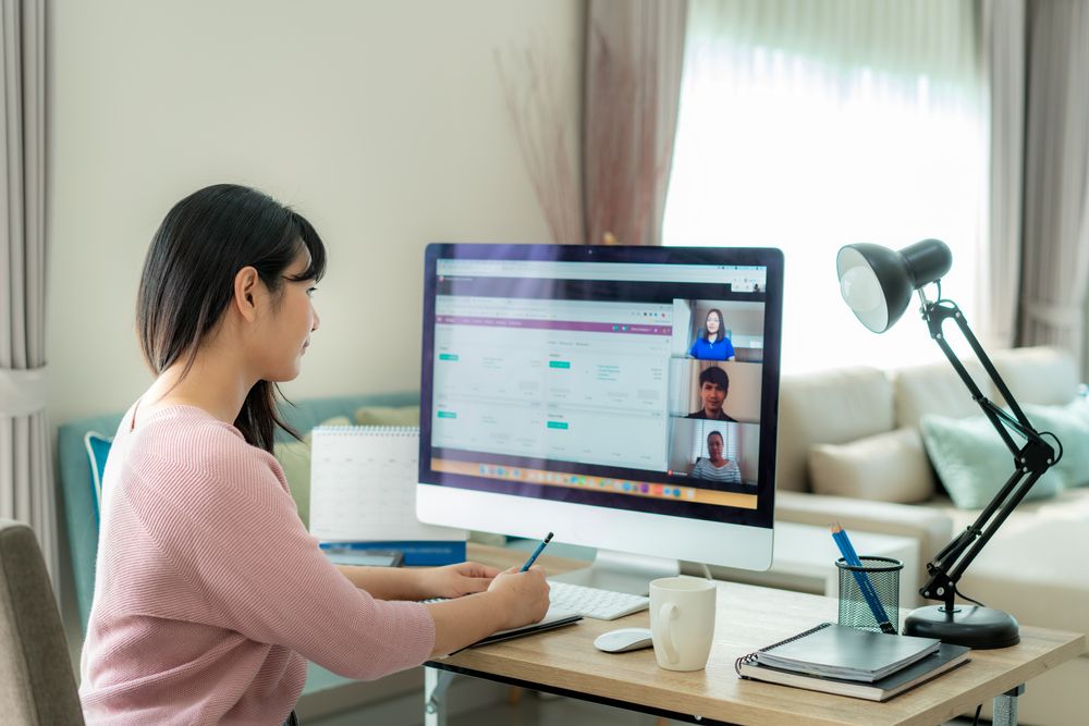 Girl at a desk working from home