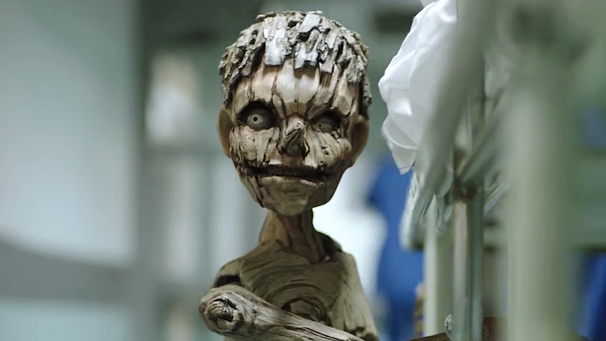 Pinocchio holding onto the side of a hospital cart in Pinocchio Unstrung