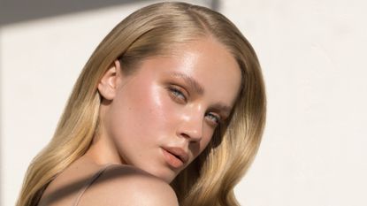 model with glowing skin from ectoin